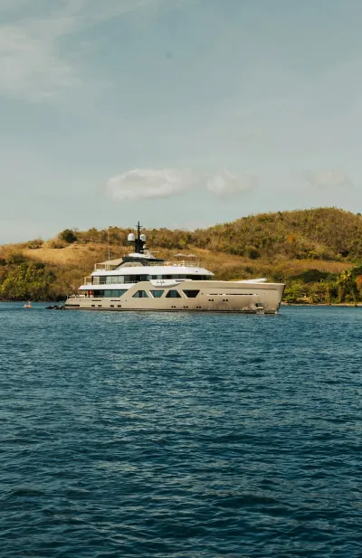 Motor yacht anchored off the coast