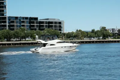 A motor yacht leaving the fuel pontoon